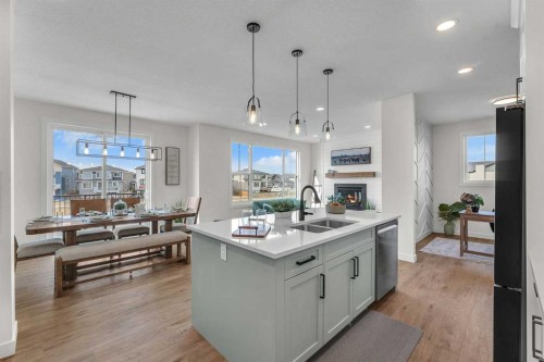 267 Kinniburgh Loop, Chestermere, AB - Indoor Photo Showing Kitchen With Double Sink With Upgraded Kitchen