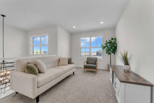 267 Kinniburgh Loop, Chestermere, AB - Indoor Photo Showing Living Room