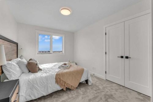 267 Kinniburgh Loop, Chestermere, AB - Indoor Photo Showing Bedroom