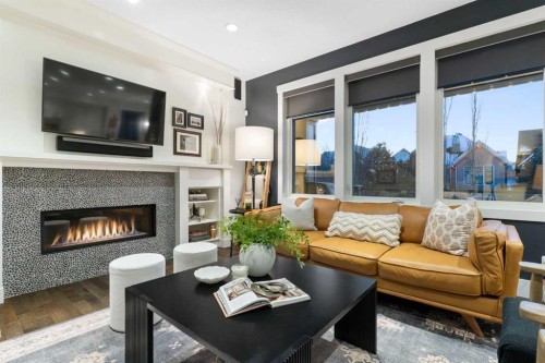 267 Coopers Hill Sw, Airdrie, AB - Indoor Photo Showing Living Room With Fireplace