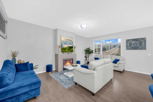 84 Nolanhurst Heights Nw, Calgary, AB - Indoor Photo Showing Living Room With Fireplace