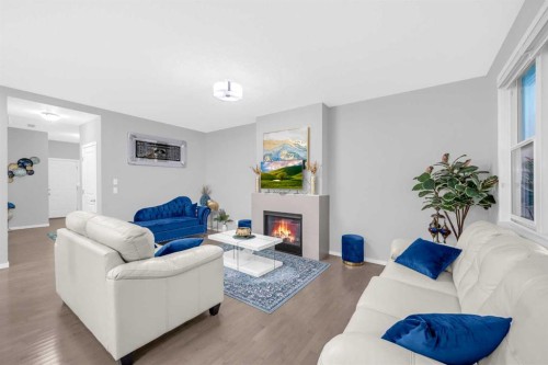 84 Nolanhurst Heights Nw, Calgary, AB - Indoor Photo Showing Living Room With Fireplace