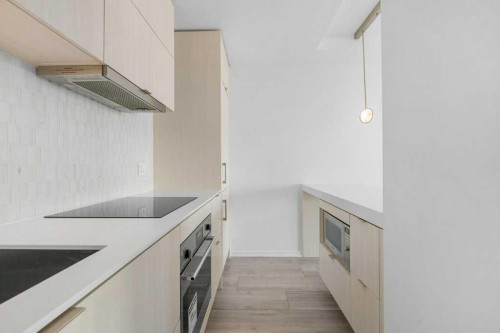 130-615 6 Avenue Se, Calgary, AB - Indoor Photo Showing Kitchen