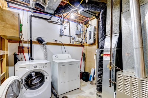 1408 106 Avenue Sw, Calgary, AB - Indoor Photo Showing Laundry Room