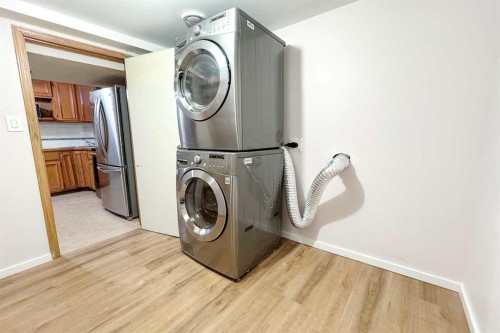 8328 Edgevalley Drive Nw, Calgary, AB - Indoor Photo Showing Laundry Room