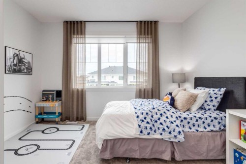 560 Walgrove Boulevard Se, Calgary, AB - Indoor Photo Showing Bedroom