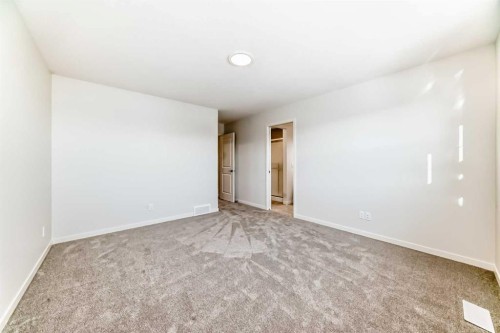 91 Bartlett Crescent Se, Calgary, AB - Indoor Photo Showing Other Room