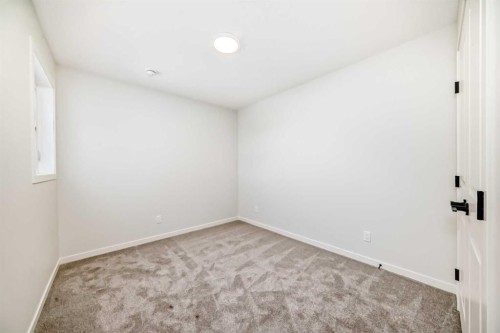 91 Bartlett Crescent Se, Calgary, AB - Indoor Photo Showing Other Room