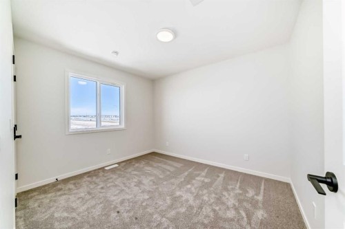 91 Bartlett Crescent Se, Calgary, AB - Indoor Photo Showing Other Room