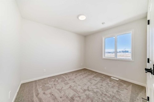 91 Bartlett Crescent Se, Calgary, AB - Indoor Photo Showing Other Room