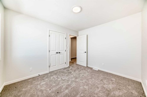 91 Bartlett Crescent Se, Calgary, AB - Indoor Photo Showing Other Room