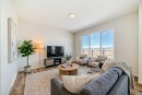 91 Bartlett Crescent Se, Calgary, AB  - Indoor Photo Showing Living Room 