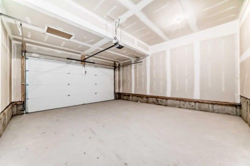 91 Bartlett Crescent Se, Calgary, AB - Indoor Photo Showing Garage