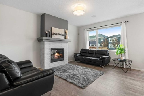 96 Belmont Terrace Sw, Calgary, AB - Indoor Photo Showing Living Room With Fireplace