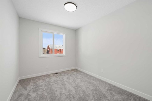 420 Fireside Drive, Cochrane, AB - Indoor Photo Showing Other Room