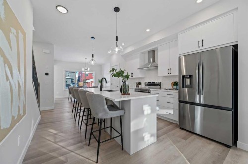 420 Fireside Drive, Cochrane, AB - Indoor Photo Showing Kitchen With Stainless Steel Kitchen With Upgraded Kitchen