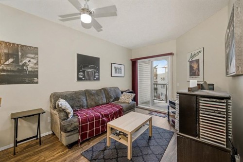 3309-73 Erin Woods Court Se, Calgary, AB - Indoor Photo Showing Living Room