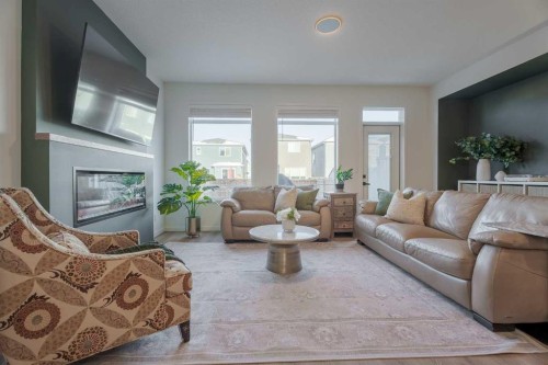 159 Belmont Crescent Sw, Calgary, AB - Indoor Photo Showing Living Room With Fireplace
