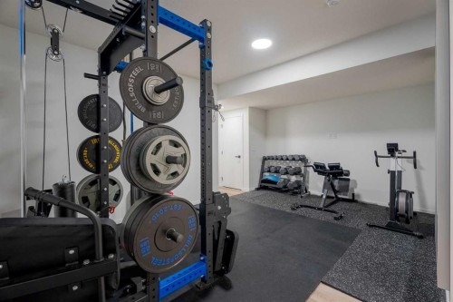159 Belmont Crescent Sw, Calgary, AB - Indoor Photo Showing Gym Room