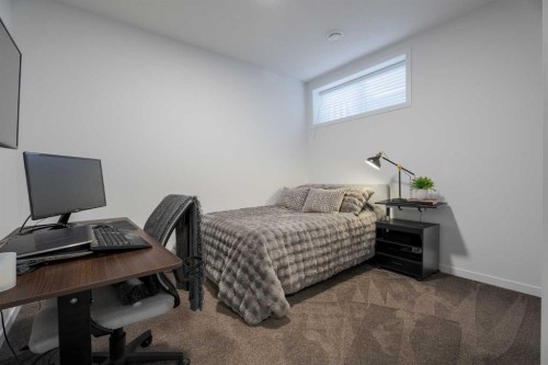 159 Belmont Crescent Sw, Calgary, AB - Indoor Photo Showing Bedroom