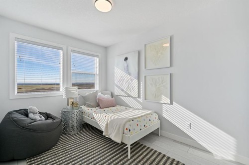 130 Mallard Heath Se, Calgary, AB - Indoor Photo Showing Bedroom