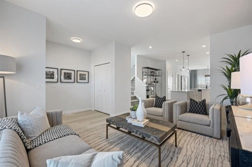 130 Mallard Heath Se, Calgary, AB - Indoor Photo Showing Living Room