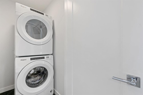 130 Mallard Heath Se, Calgary, AB - Indoor Photo Showing Laundry Room
