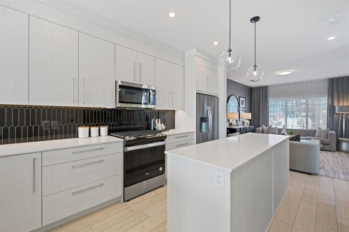 130 Mallard Heath Se, Calgary, AB - Indoor Photo Showing Kitchen With Upgraded Kitchen