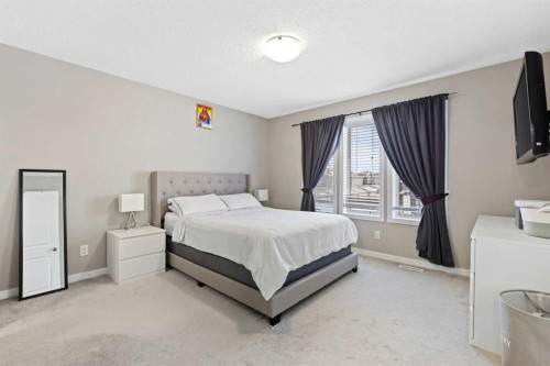 754 Belmont Drive Sw, Calgary, AB - Indoor Photo Showing Bedroom