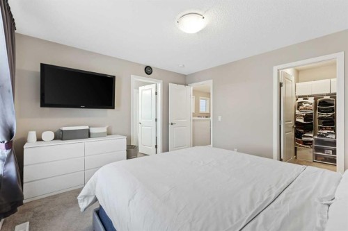 754 Belmont Drive Sw, Calgary, AB - Indoor Photo Showing Bedroom