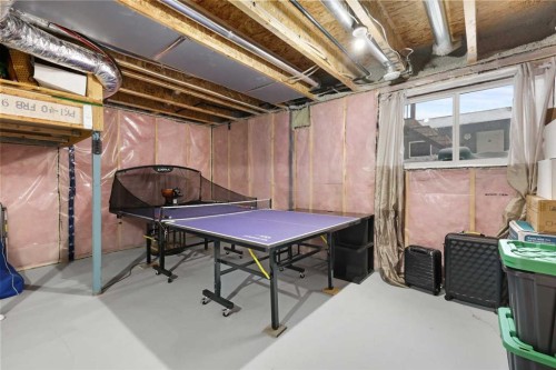 754 Belmont Drive Sw, Calgary, AB - Indoor Photo Showing Basement