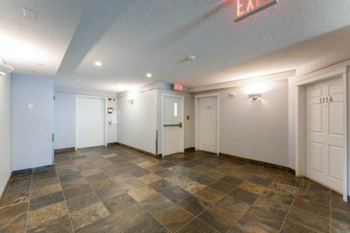 1109-70 Panamount Drive Nw, Calgary, AB - Indoor Photo Showing Other Room