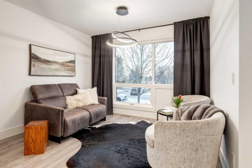 27 Hendon Place Nw, Calgary, AB - Indoor Photo Showing Living Room