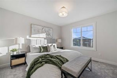 424 Fireside Drive, Cochrane, AB - Indoor Photo Showing Bedroom