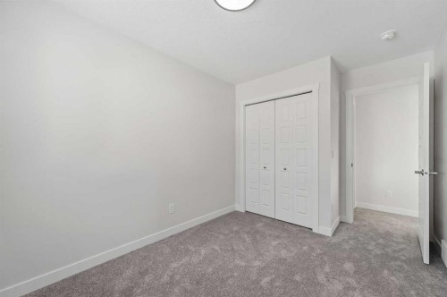 424 Fireside Drive, Cochrane, AB - Indoor Photo Showing Other Room