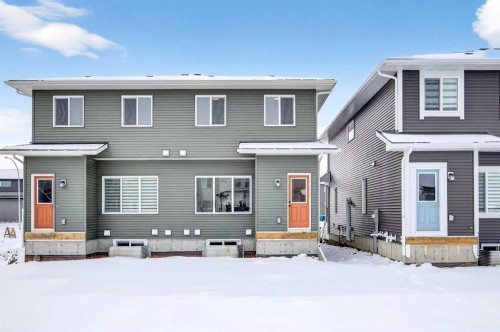 424 Fireside Drive, Cochrane, AB - Outdoor With Facade