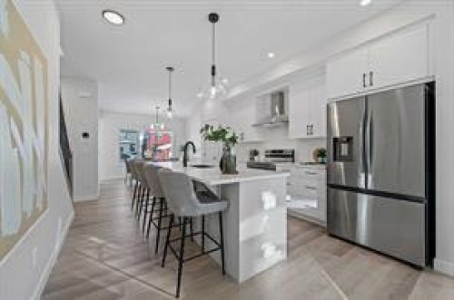 424 Fireside Drive, Cochrane, AB - Indoor Photo Showing Kitchen With Stainless Steel Kitchen With Upgraded Kitchen