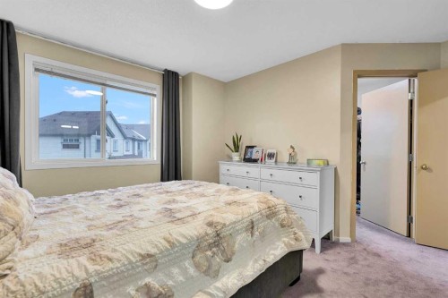 300 Copperstone Cove Se, Calgary, AB - Indoor Photo Showing Bedroom