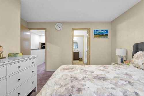 300 Copperstone Cove Se, Calgary, AB - Indoor Photo Showing Bedroom