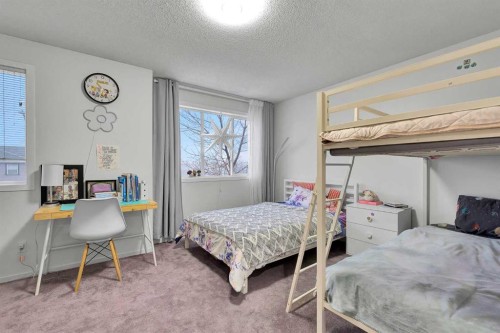 300 Copperstone Cove Se, Calgary, AB - Indoor Photo Showing Bedroom