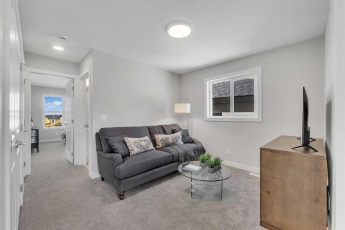 1205 Iron Ridge Avenue, Crossfield, AB - Indoor Photo Showing Living Room