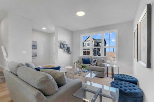 1205 Iron Ridge Avenue, Crossfield, AB - Indoor Photo Showing Living Room