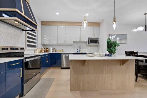 414 Corner Meadows Square Ne, Calgary, AB - Indoor Photo Showing Kitchen With Upgraded Kitchen