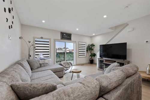 414 Corner Meadows Square Ne, Calgary, AB - Indoor Photo Showing Living Room