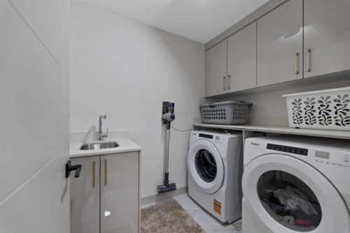414 Corner Meadows Square Ne, Calgary, AB - Indoor Photo Showing Laundry Room