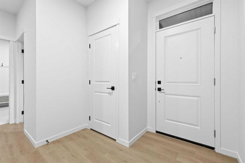 48 Herron Way Ne, Calgary, AB - Indoor Photo Showing Other Room