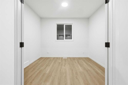 48 Herron Way Ne, Calgary, AB - Indoor Photo Showing Other Room