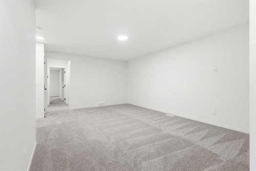 48 Herron Way Ne, Calgary, AB - Indoor Photo Showing Other Room