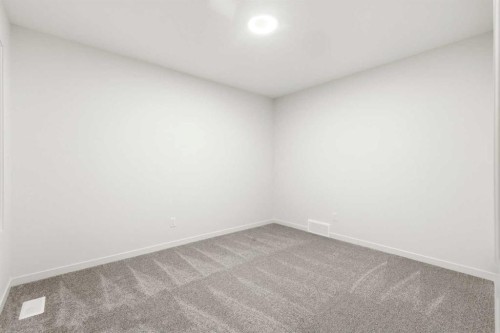 48 Herron Way Ne, Calgary, AB - Indoor Photo Showing Other Room
