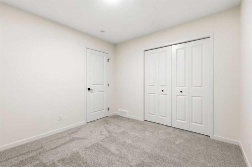 48 Herron Way Ne, Calgary, AB - Indoor Photo Showing Other Room